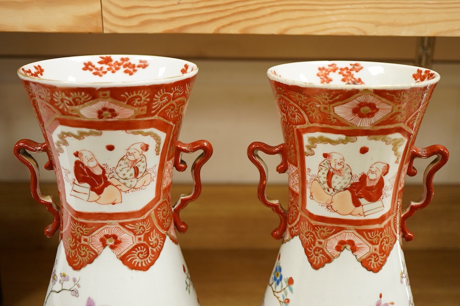 A pair of Japanese Kutani two handled vases, 41cm high